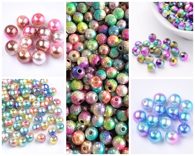 May include: Assortment of iridescent round beads in various pastel colors, including pink, blue, green, and purple. The beads have a pearlescent finish and are perfect for crafting jewelry or other decorative projects.