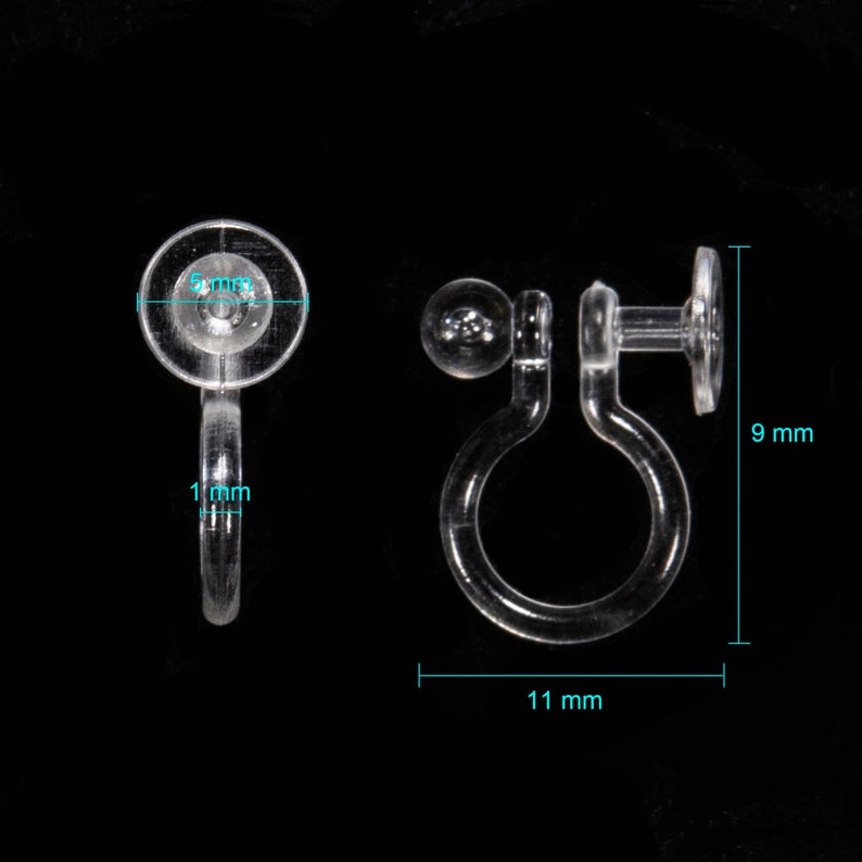 May include: Clear plastic earring backs with a 9 mm diameter and a 11 mm length. The backs have a small ball on one side and a flat disc on the other.