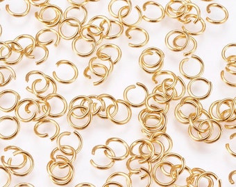 200 anillos de salto abiertos, 5 mm, acero inoxidable chapado en oro real de 24 k, conectores de metal para manualidades de joyería y llaveros, calibre 21, 5 x 0,7 mm