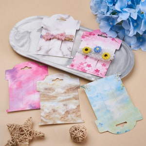 100 tarjetas con pasadores para el pelo, colores y diseños variados, flores, tarjetas de presentación en blanco, tarjetas de presentación de joyas, rectángulo, 5 estilos, cartón