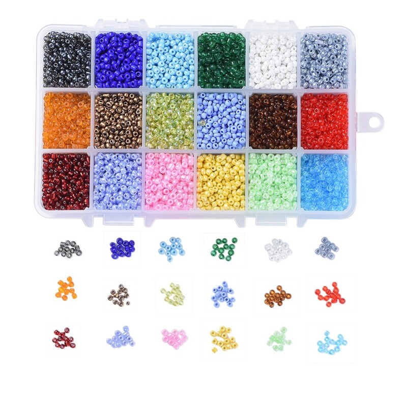 May include: A clear plastic storage box with 18 compartments filled with various colours of seed beads. Each compartment has a small pile of beads in front of the box.