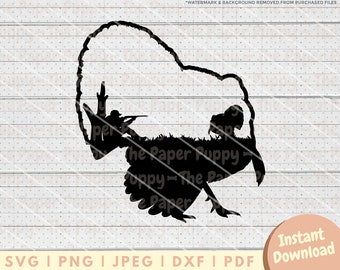 May include: Black silhouette of a turkey with a hunter inside. The turkey is running and the hunter is aiming a gun. The text "The Paper Puppy" is visible in the image.