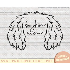 May include: Black and white line art illustration of a dog's head with the text "boykin mom" written inside the head.