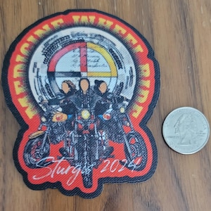 May include: Red, yellow, and black embroidered patch with the text "We Ride Together" in a circle around a Native American medicine wheel design. Three figures are riding motorcycles with the text "Sturgis 2024" below.