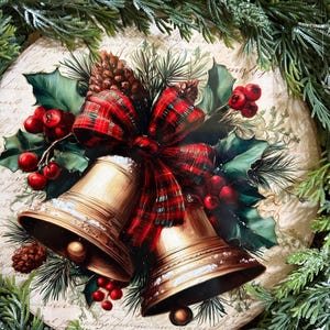 May include: A round decorative plaque featuring a printed illustration of two gold-colored bells tied with a red and green plaid ribbon, surrounded by green holly leaves, red berries, and pine cones against a beige background with script text.