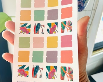 May include: A sheet of stickers with 16 different colored squares. Each square has a small floral design with pink flowers and green leaves. The sheet is white with a black border. The text "BeriaValenciaArt.etsy.com" is printed at the bottom of the sheet.
