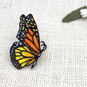 Danaus Genutia vlinderpatch: geborduurde strijkapplicatie
