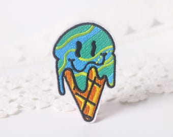 Geborduurde patch smeltend ijs: grappige opstrijkappliqué