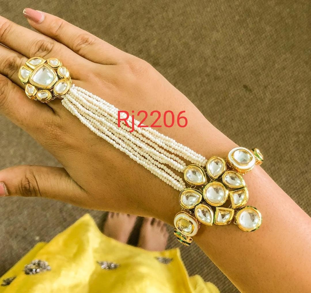 Modern Indian jewelry - Kundan bracelet with attached Ring for Brides – B  Anu Designs