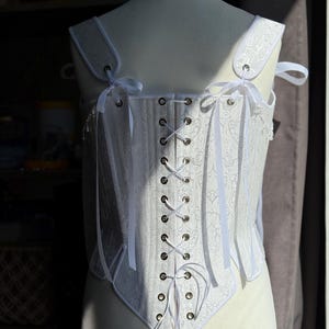 white satin jacquard renaissance corset with lace up front and back, structured overbust bodice with boning and optional straps
