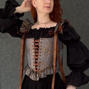 gothic lace up corset for women with structured bodice and shoulder ties, historical overbust corset in dark vintage style