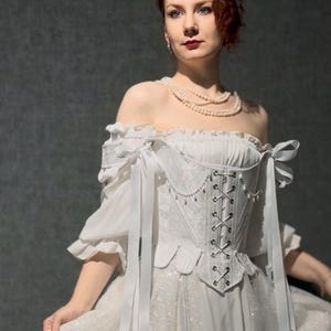 white satin jacquard renaissance corset with lace up front and back, structured overbust bodice with boning and optional straps