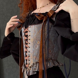 gothic lace up corset for women with structured bodice and shoulder ties, historical overbust corset in dark vintage style