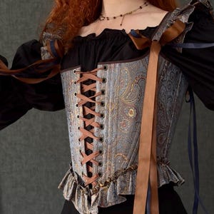 gothic lace up corset for women with structured bodice and shoulder ties, historical overbust corset in dark vintage style