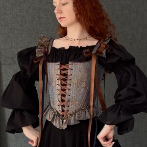 gothic lace up corset for women with structured bodice and shoulder ties, historical overbust corset in dark vintage style