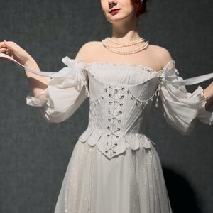 white satin jacquard renaissance corset with lace up front and back, structured overbust bodice with boning and optional straps
