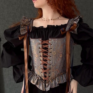 gothic lace up corset for women with structured bodice and shoulder ties, historical overbust corset in dark vintage style