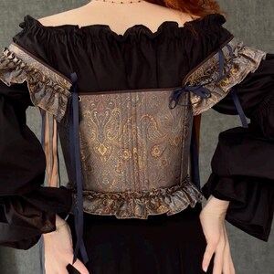 gothic lace up corset for women with structured bodice and shoulder ties, historical overbust corset in dark vintage style