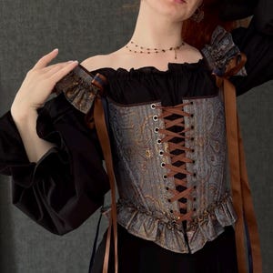 gothic lace up corset for women with structured bodice and shoulder ties, historical overbust corset in dark vintage style