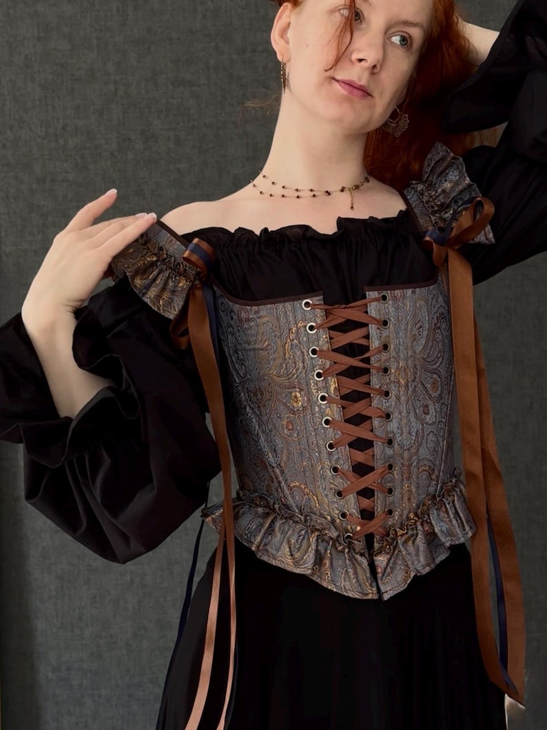 gothic lace up corset for women with structured bodice and shoulder ties, historical overbust corset in dark vintage style