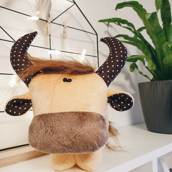 Don the beige Buffalo. Buffalo plush toy. Sand color bison.