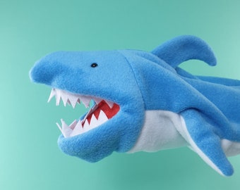 Blue shark puppet with opening mouth. Fleece shark hand puppet with cotton lining.