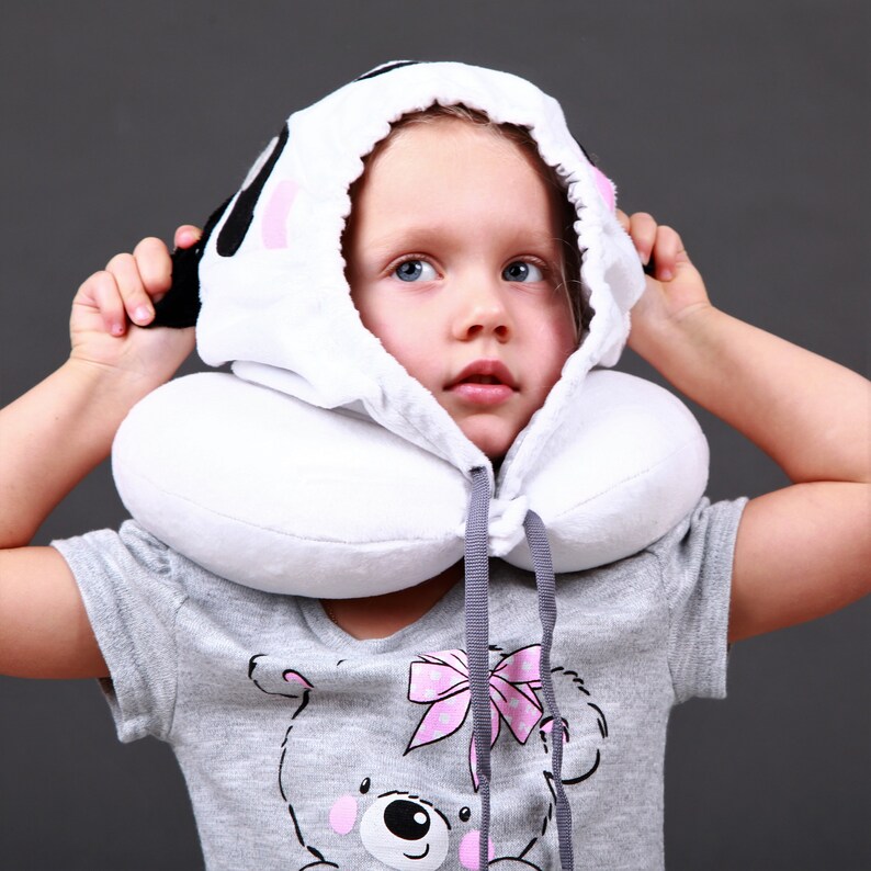 Travel pillow with hood for comfortable journey. Neck ...
