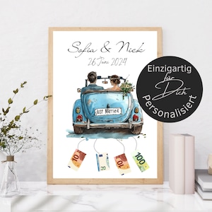 May include: A framed watercolour print depicting a light blue vintage car with a couple inside, labelled "Just Married." The print includes the names "Sofia & Nick" and the date "26. Juni 2024," with Euro banknotes attached.