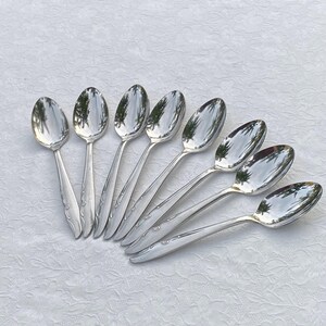 Vintage Mermaid Stainless Set of Eight Teaspoons Decorators by Oneida Circa 1990s