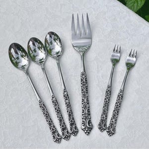 Vintage Old Baroque Stainless Flatware Mixed Lot of Six Pieces Circa 1970s