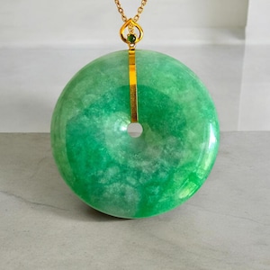 Cheung&#39;s Round Donut Burmese A-Jade 40mm Pendant with 18K Yellow Gold - Certified