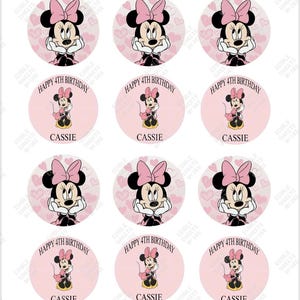 May include: A sheet of edible cupcake toppers featuring Minnie Mouse. Some toppers show Minnie with a pink bow and heart background. Other toppers say "Happy 4th Birthday Cassie".