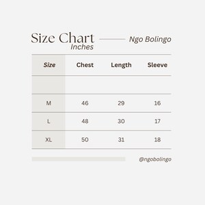 May include: A size chart in inches for Ngo Bolingo clothing. The chart includes sizes M, L, and XL, with chest, length, and sleeve measurements. The chart is on a light beige background. The Ngo Bolingo logo is in the top right corner.