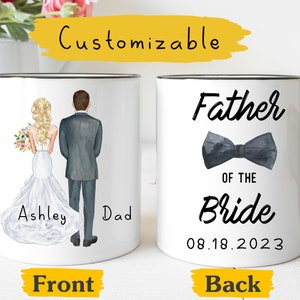 May include: White ceramic mug with a black handle. The front of the mug features a watercolor illustration of a bride and groom with the text "Ashley Dad". The back of the mug features the text "Father of the Bride" with a black bow tie and the date "08.18.2023".