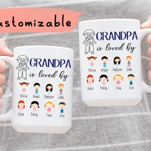 May include: White ceramic mug with a blue inscription that reads "GRANDPA is loved by". The mug features a cartoon drawing of a man with a beard and the word "This" written on his shirt. Below the inscription are eight cartoon drawings of children with their names printed below each drawing. The names are Olivia, Grant, Harper, John, Julia, Emily, Tina, and Zoe.