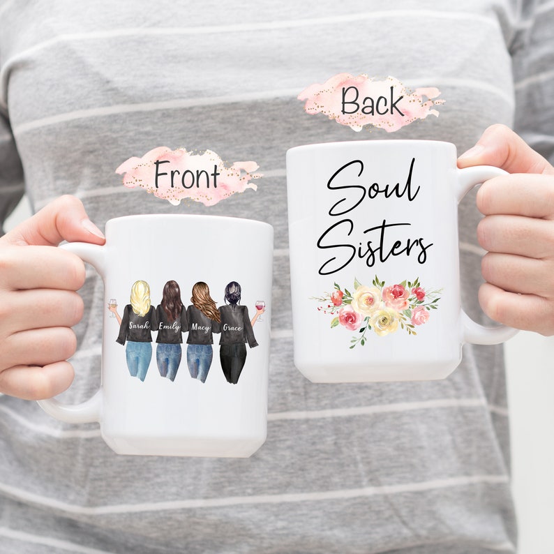 May include: White ceramic mug with a black and white illustration of four women with wine glasses. The text "Soul Sisters" is on the back of the mug with a floral design.