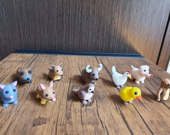 May include: A collection of ten small animal figurines, including a brown and white cow, a white chicken, a brown and white dog, a brown and white pig, a brown and white mouse, a brown and white kangaroo, a brown and white wombat, a brown and white echidna, a gray and white rat, and a brown and white bird.