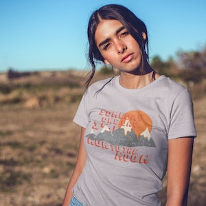 Run To The Moon • Retro Graphic Tee • Fun Run Track Club • Women&#39;s Relaxed T-Shirt