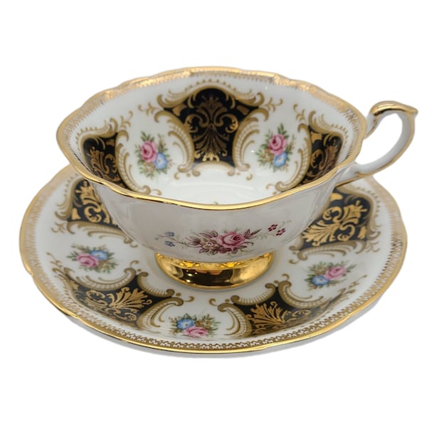 Numbered Paragon Tea Cup Matching Saucer Black Medallions Gold Filigree Pink & Blue Flowers Gilt Decorative Edges 1950s Rare Tea Cup
