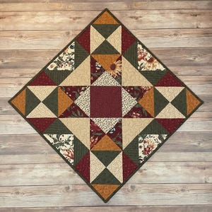 Quilted Half-square Kansas Troubles Expanding Star Table Topper / Wallhanging, 24" square