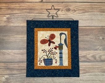 Quilted Flossie's Flowers Small Butterfly and Water Pump Wallhanging, 18" x 16" with included Star Hanger