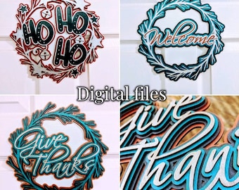 May include: Four digital files for creating layered wood signs. The signs feature a wreath design with the words "Ho Ho Ho", "Welcome", "Give Thanks", and "Give Thanks" in a layered, multi-colored design.