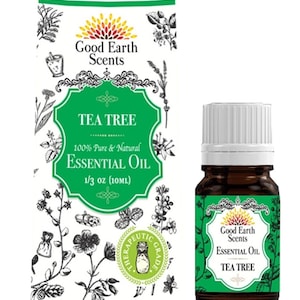 May include: A brown glass bottle of tea tree essential oil with a white cap, next to a matching box. The box and bottle label feature green and white designs with the text "Good Earth Scents" and "Tea Tree Essential Oil". The bottle contains 1/3 oz (10ml).