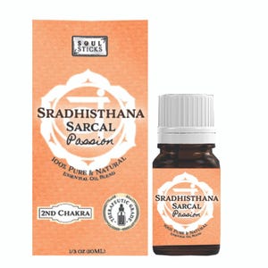 May include: An orange box and a small brown glass bottle of essential oil. The box and bottle label read "SRADHISTHANA SARCAL Passion" with the words "100% Pure & Natural Essential Oil Blend". The bottle contains 1/3 oz (10ml) of oil.
