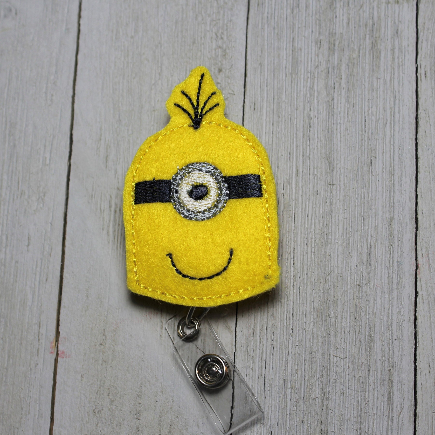 Minion retractable name badge holder, character ID tag