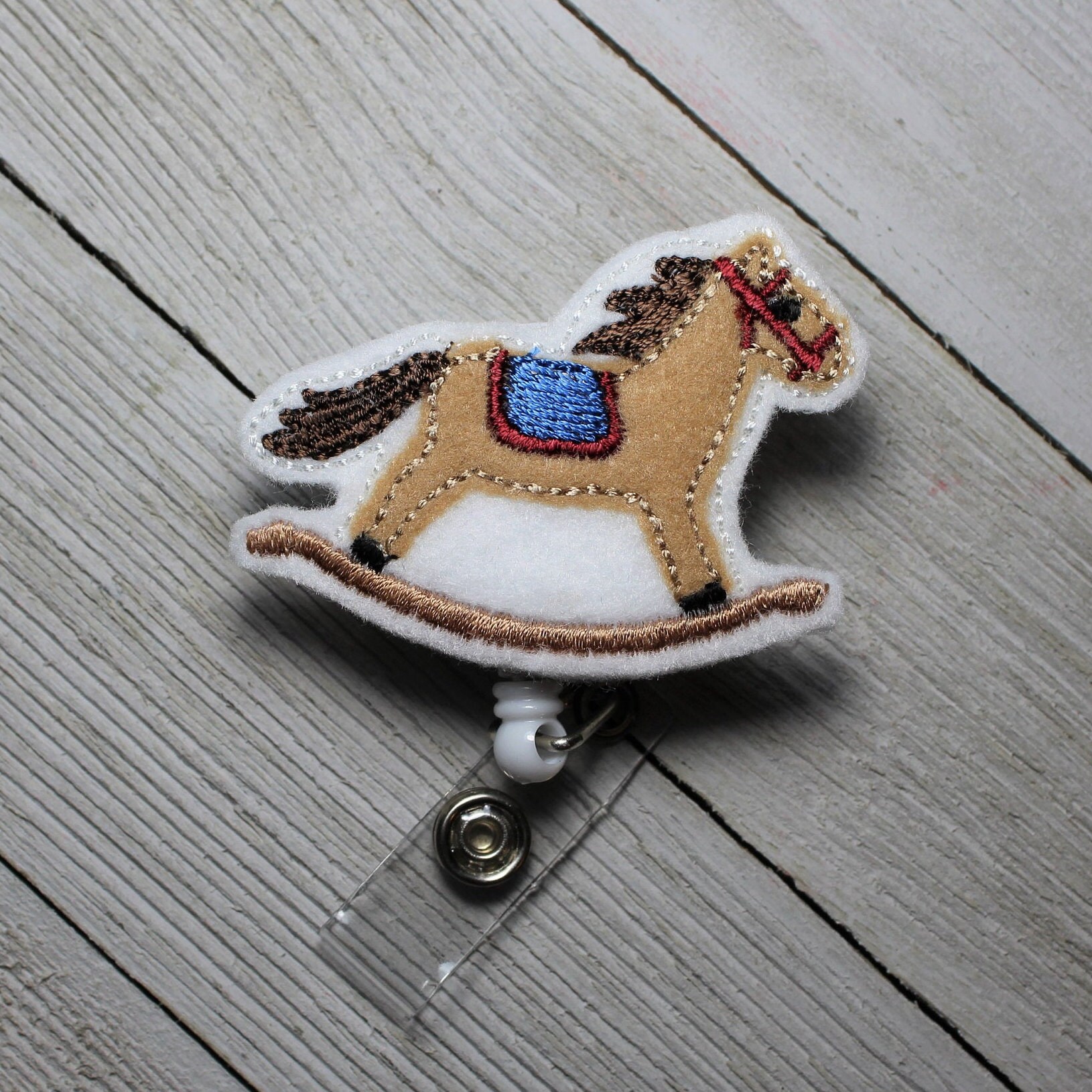 Rocking Horse badge holder with retractable reel