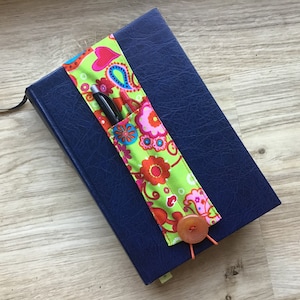 Pen holder for notebook or calendar, floral green tones