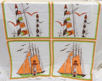 May include: A white fabric with a repeating pattern of orange and green sailboats and lighthouses. The sailboats have brown masts and orange sails. The lighthouses are brown with white stripes and orange roofs. The background is white with a green and orange border.