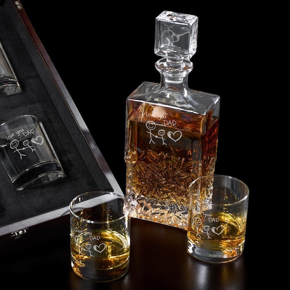 Your child's actual drawing engraved onto a whiskey decanter set — a wildly sentimental and genuinely unexpected personalization concept.