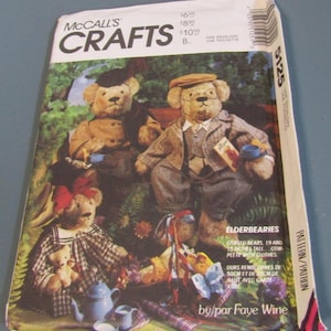 May include: A McCall's Crafts sewing pattern envelope for Elderbearies stuffed bears, 19 and 15 inches tall. The cover features an illustration of three teddy bears in clothing, including a bear in a plaid dress and two bears in suits.
